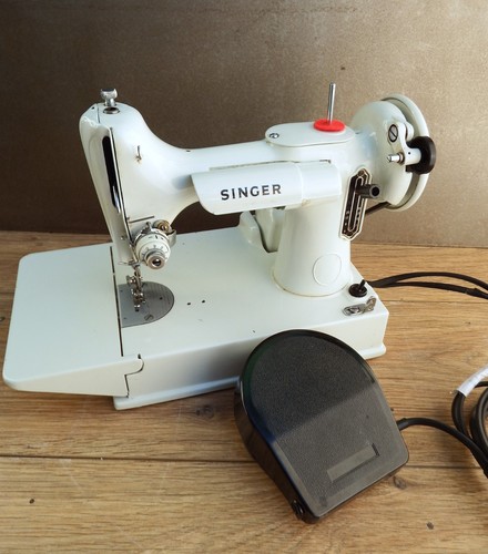 White singer featherweight - white,