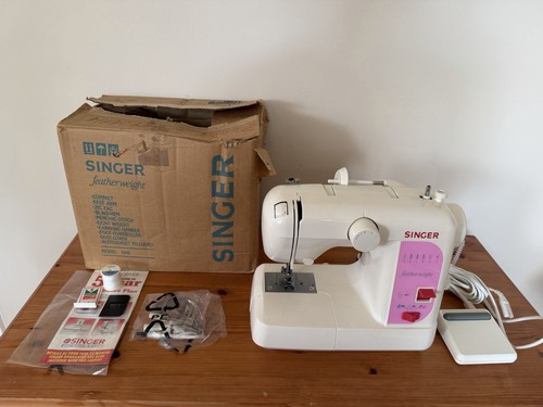 Singer model 100 portable - model,