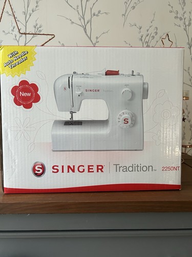 New boxed singer tradition - singer,