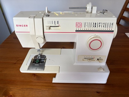 Singer sewing machine model - machine,